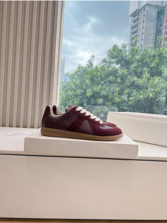 ua ma*s*n Ma*i*la mm6 sneakers