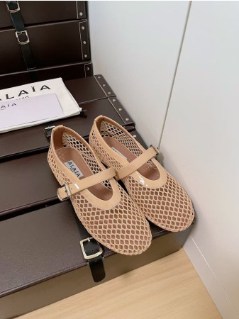 UA ALAÏA BALLET FLATS IN FISHNET