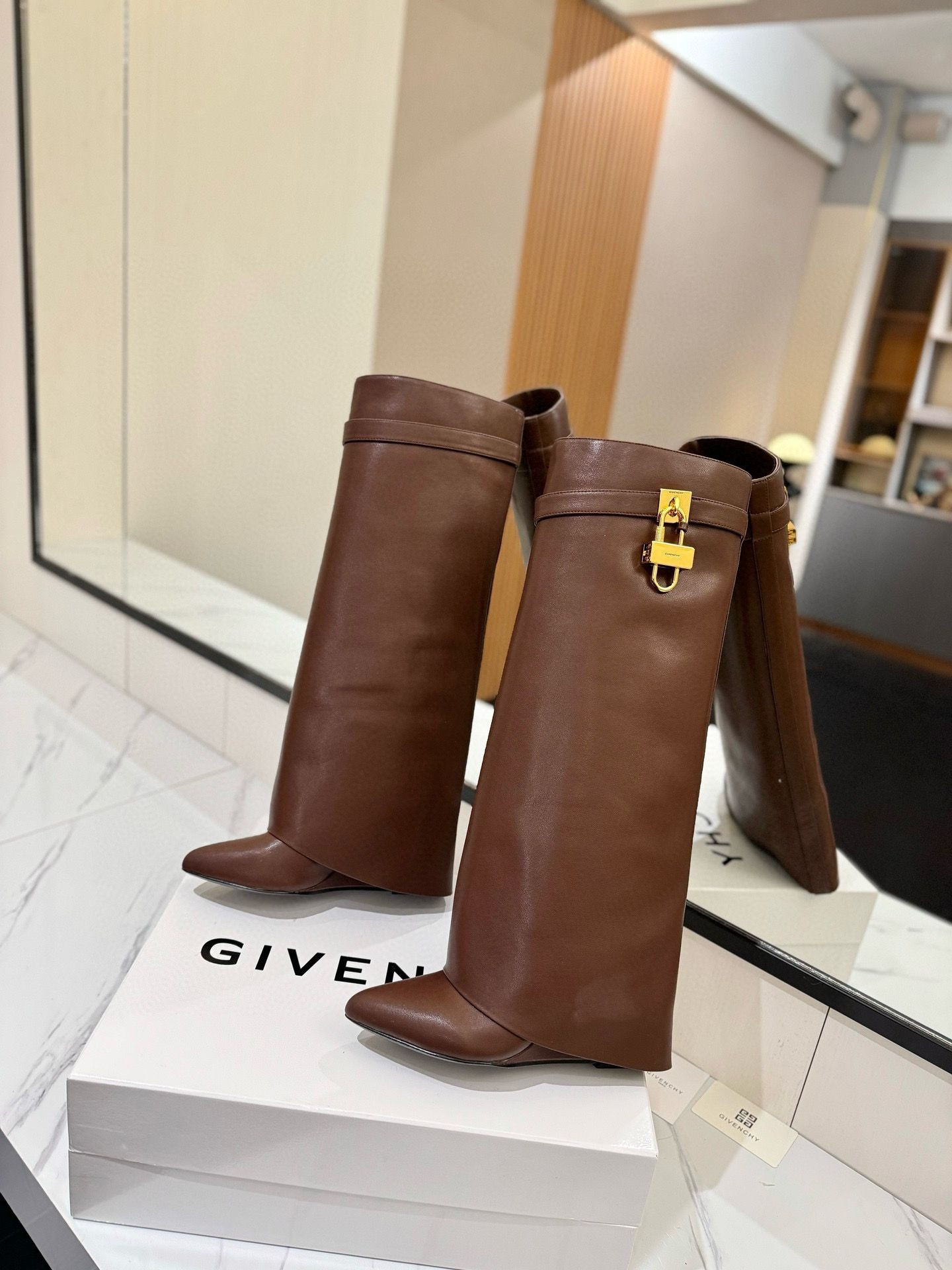 UA Givenchy Shark Lock boots in leather