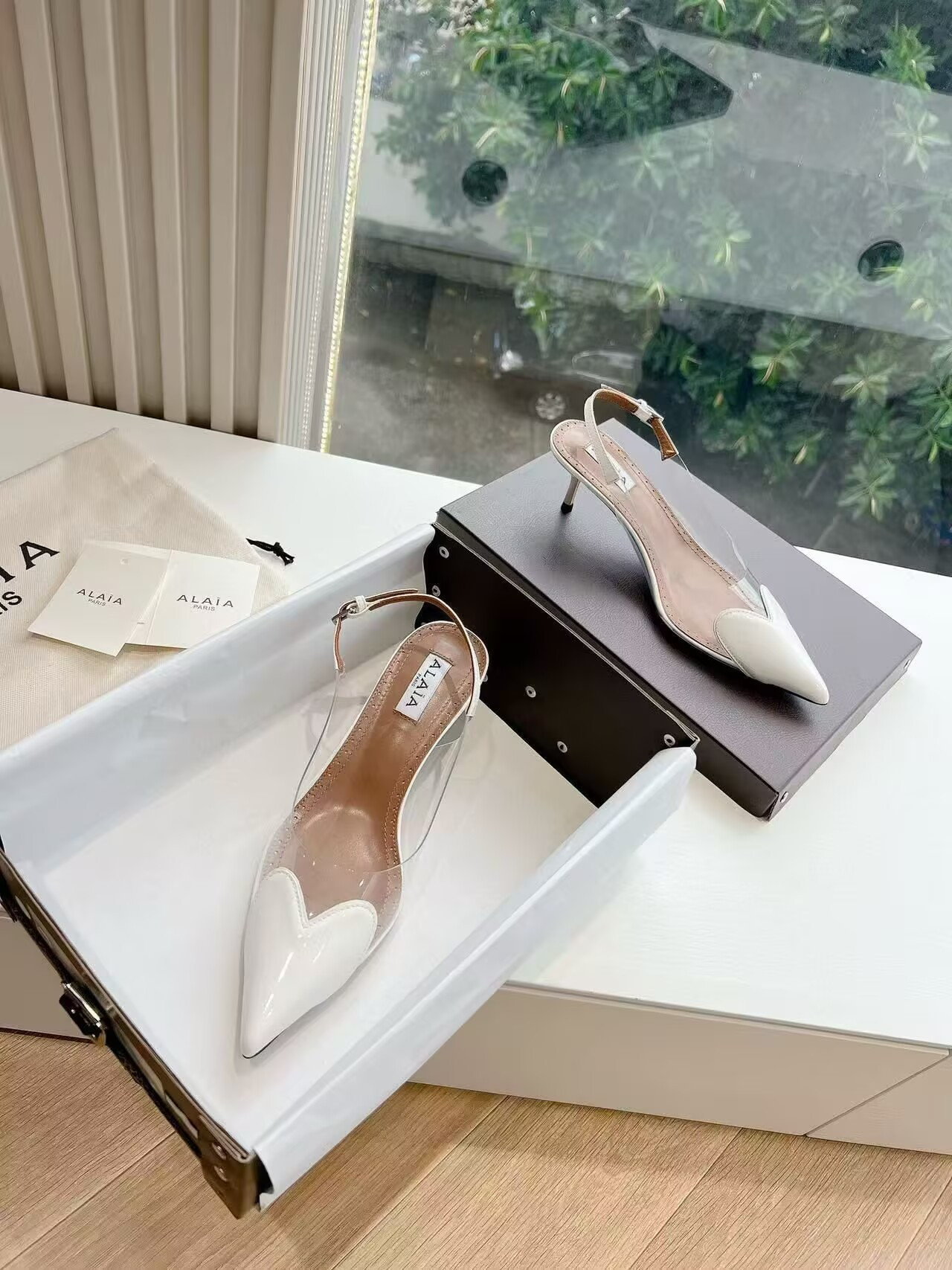 UA ALAÏA Le Coeur Plexi Heart-Toe Slingback Pump