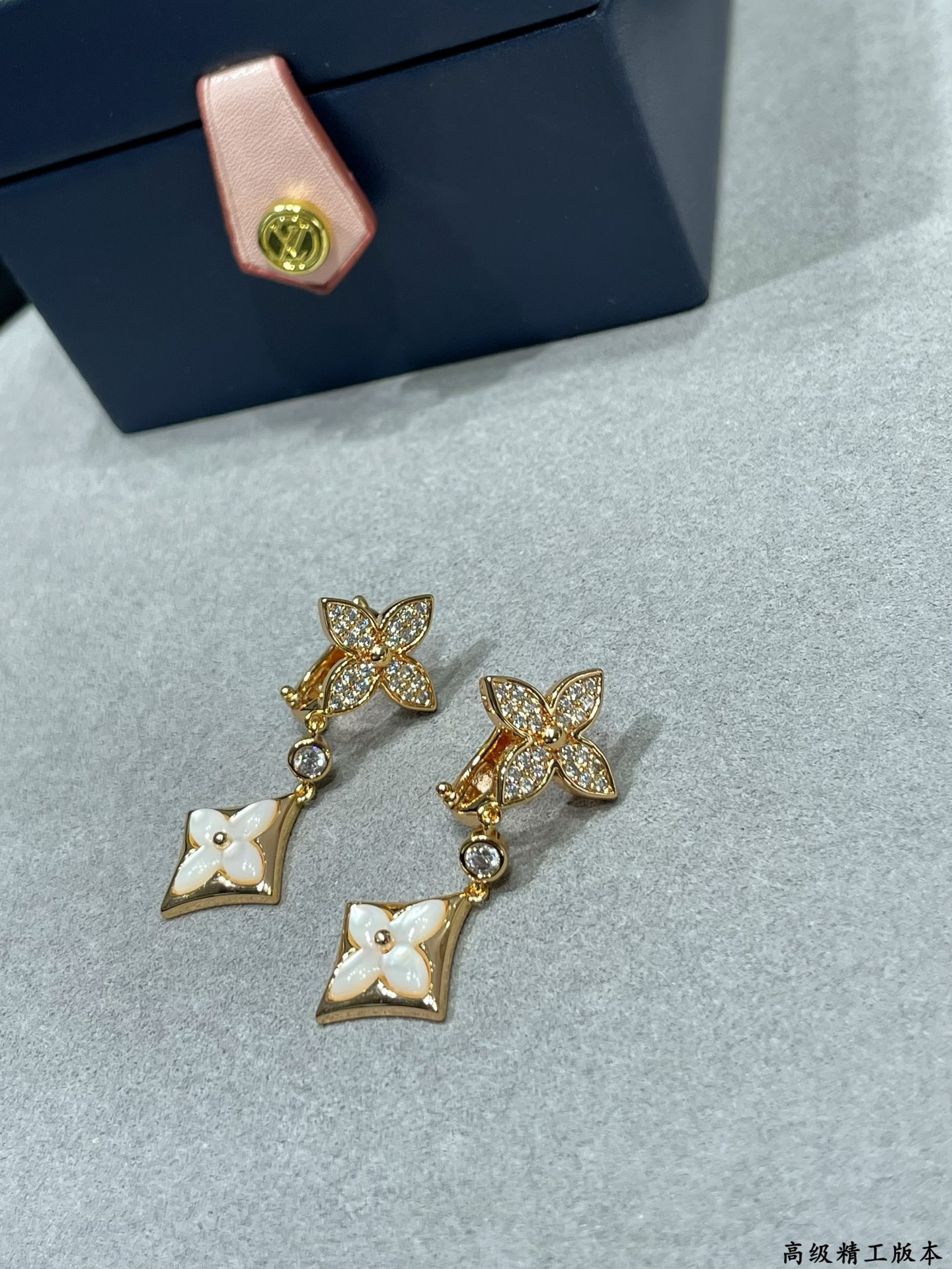 lv two flower Di*m*nd white shell earrings
