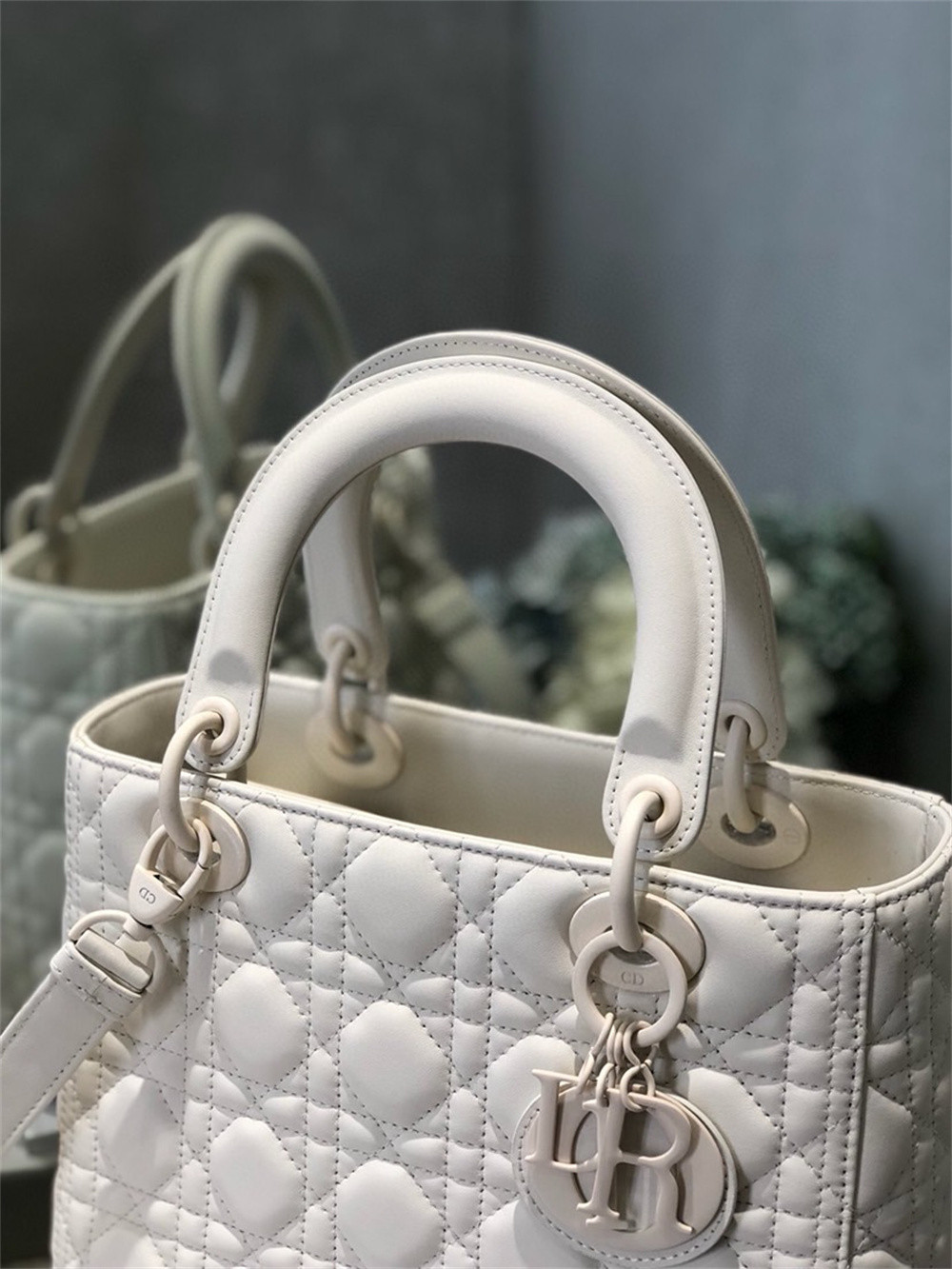 medium lady D*or bag 9.5 x 8 x 4.5 inches