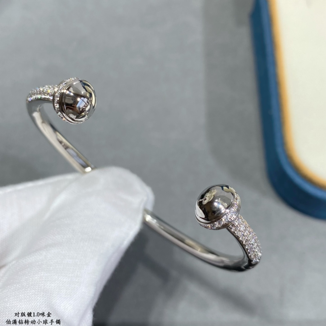 piaget fully Di*m*nd-encrusted rotating ball bracelet