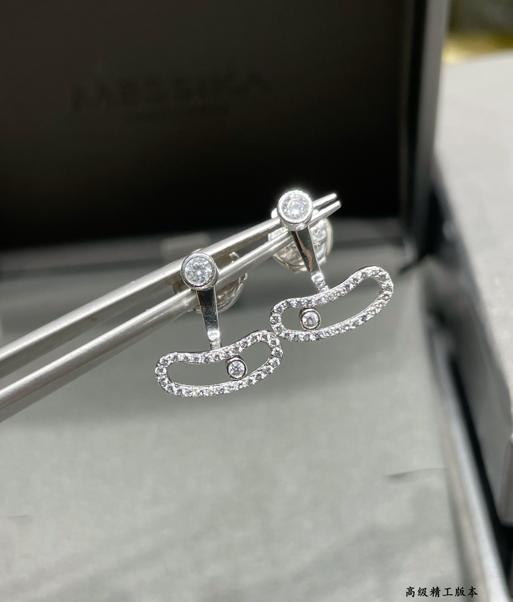 messika curved single Di*m*nd stud earrings