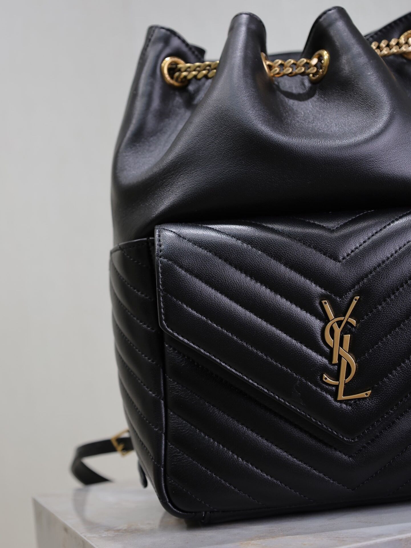 y*l Sa**t Lau*nt joe drawstring quilted backpack 22x29x15cm