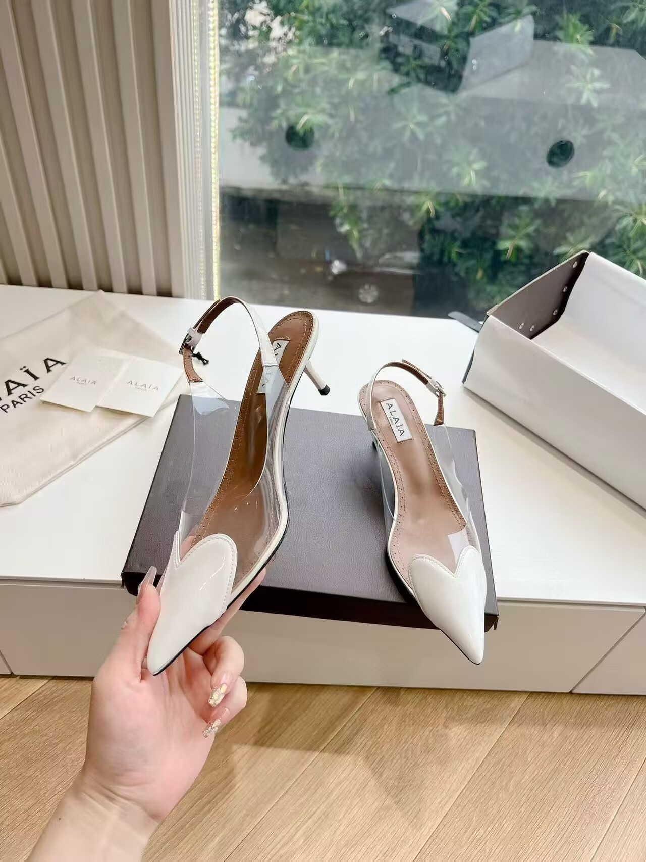 UA ALAÏA Le Coeur Plexi Heart-Toe Slingback Pump