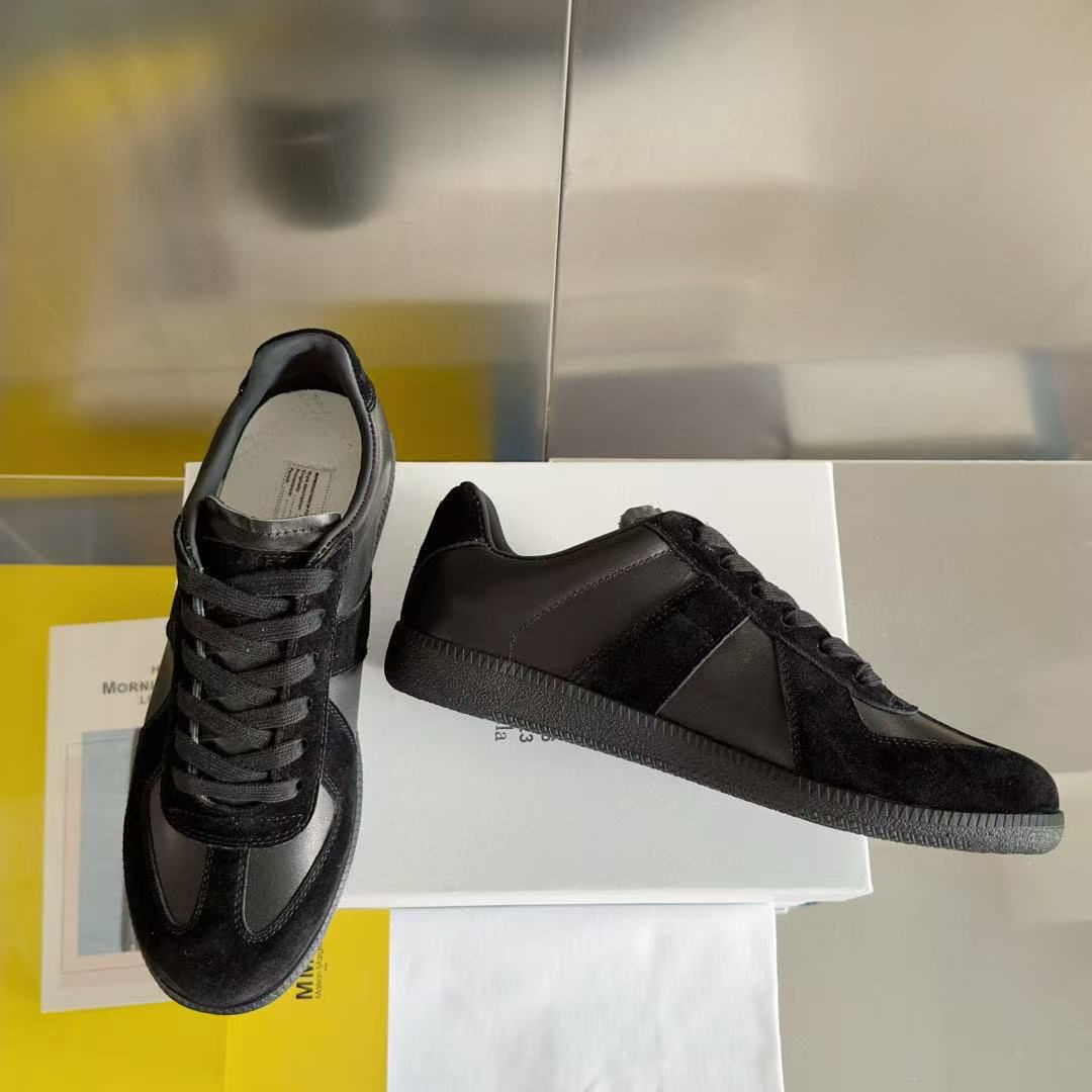 ua ma*s*n Ma*i*la mm6 sneakers