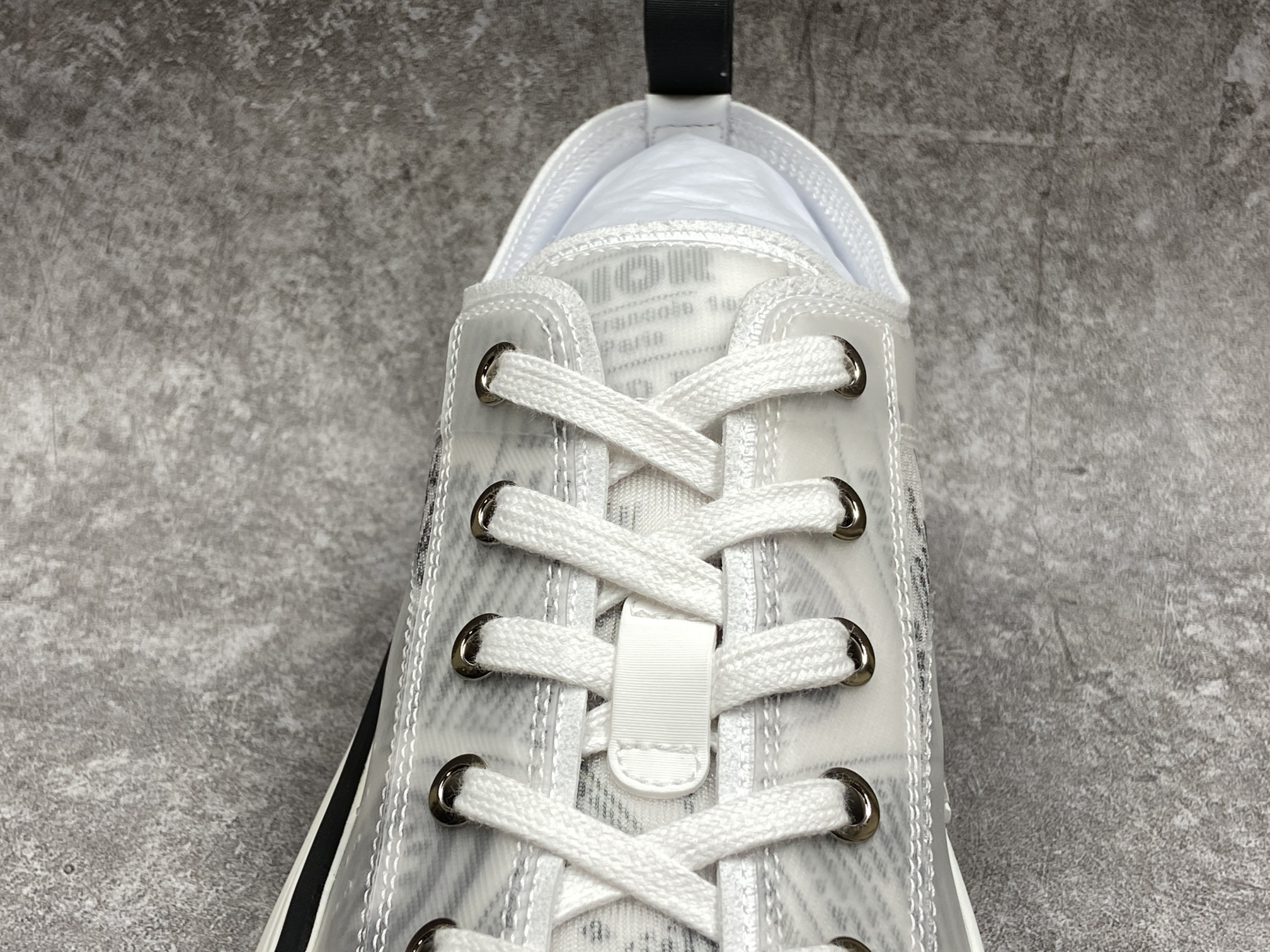 D*or b23 low top daniel asham newspaper