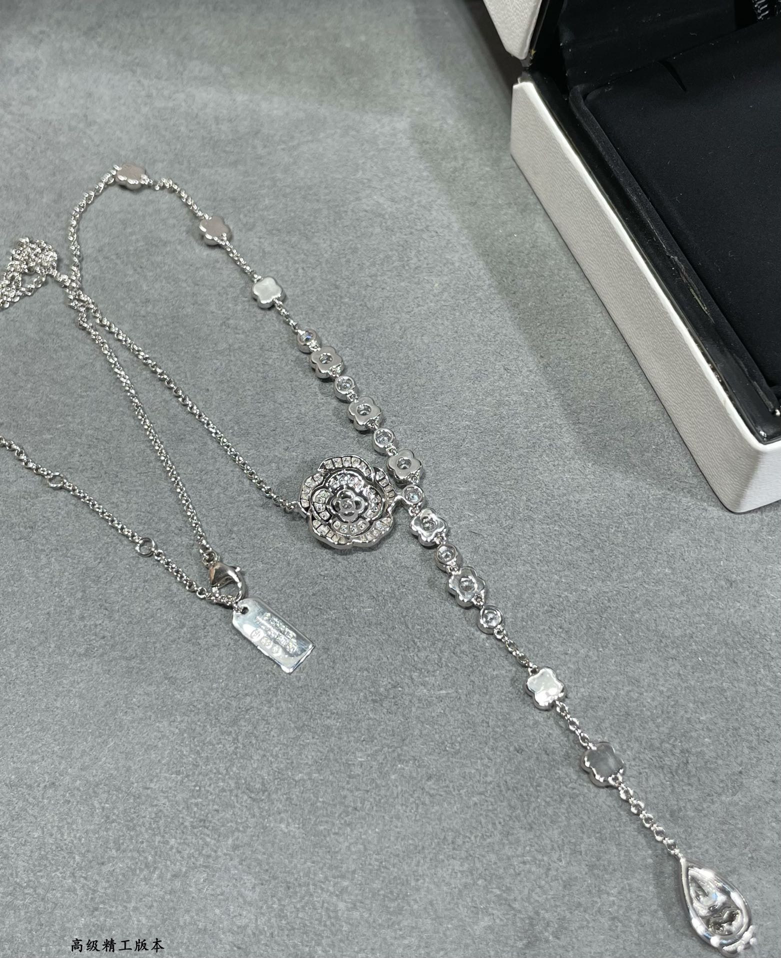 Ch*el camellia water drop tassel necklace