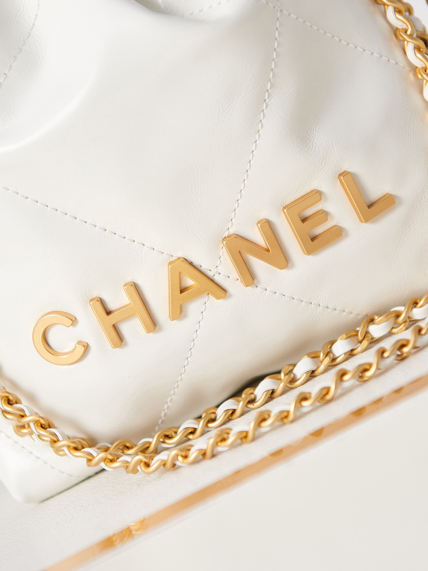 Ch*el 22 mini handbag shiny calfskin & gold-tone metal white 7.8 × 7.4 × 2.3 in