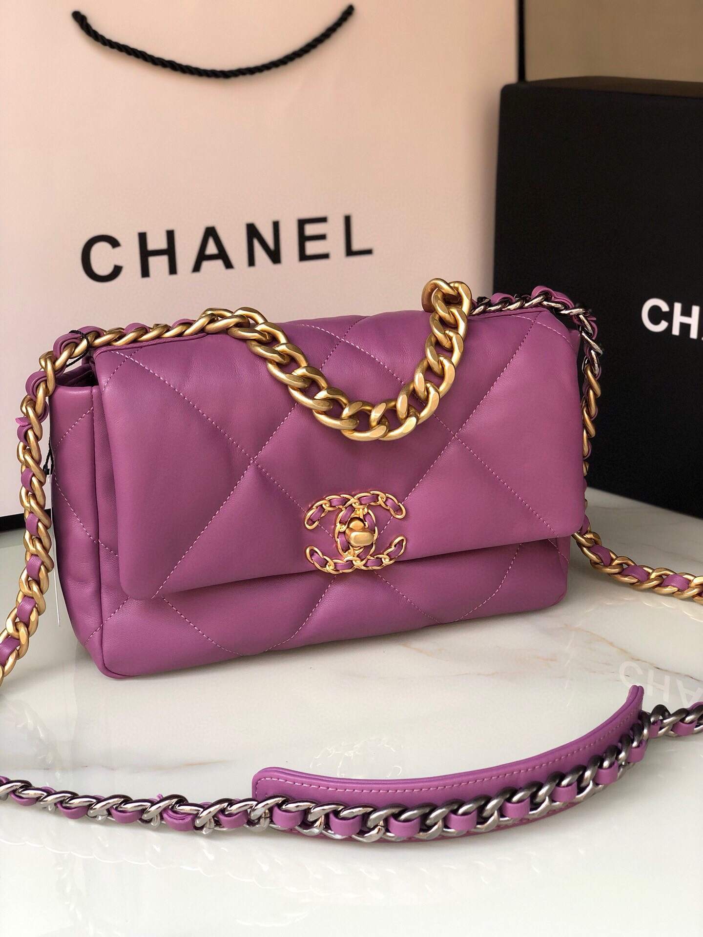 Ch*el 19 handbag shiny leather, gold-tone, silver-tone & ruthenium-finish metal purple 6.2 × 10.1 × 3.5 in