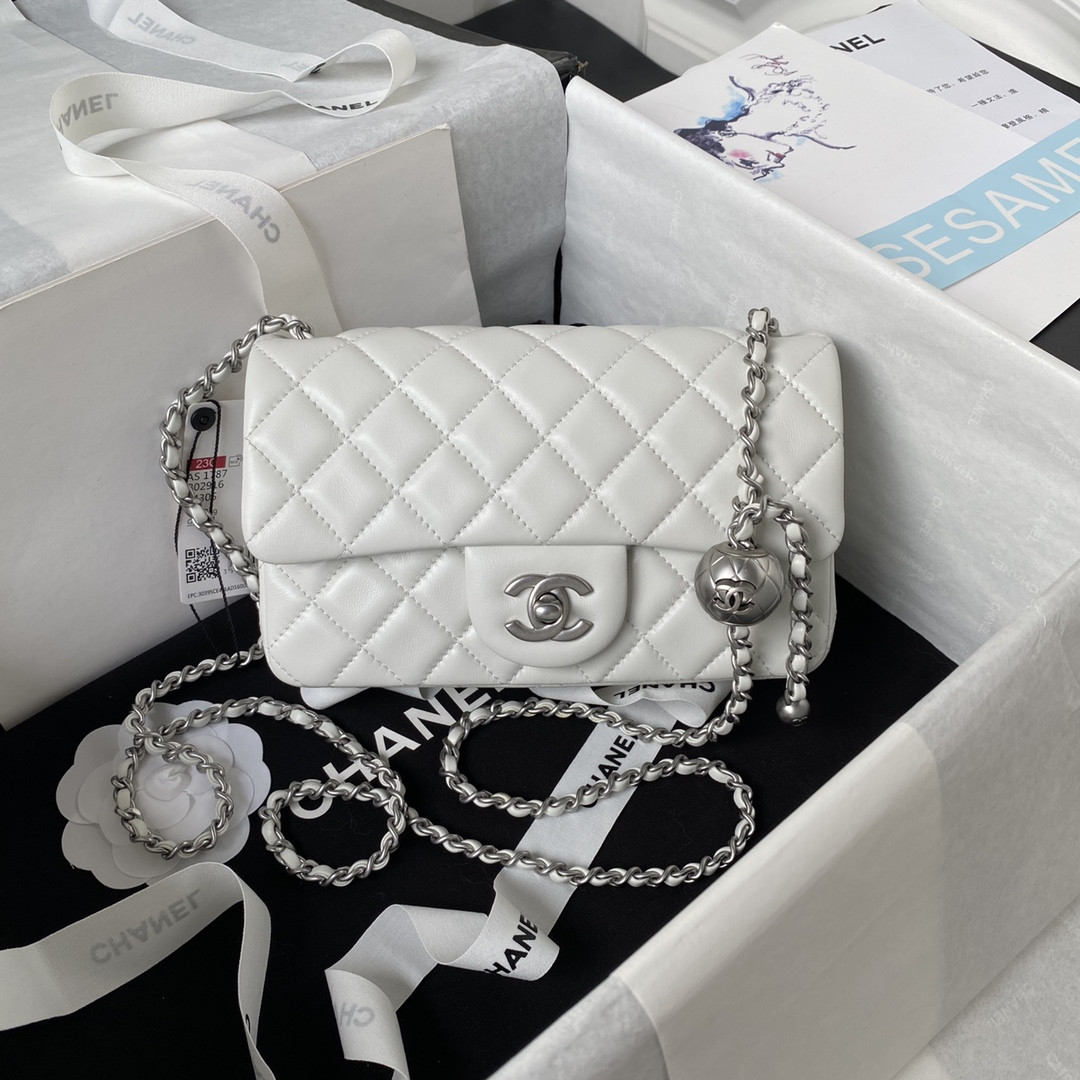 Ch*el mini flap bag shiny calfskin & silver-tone metal white 4.7 × 7.8 × 2.3 in