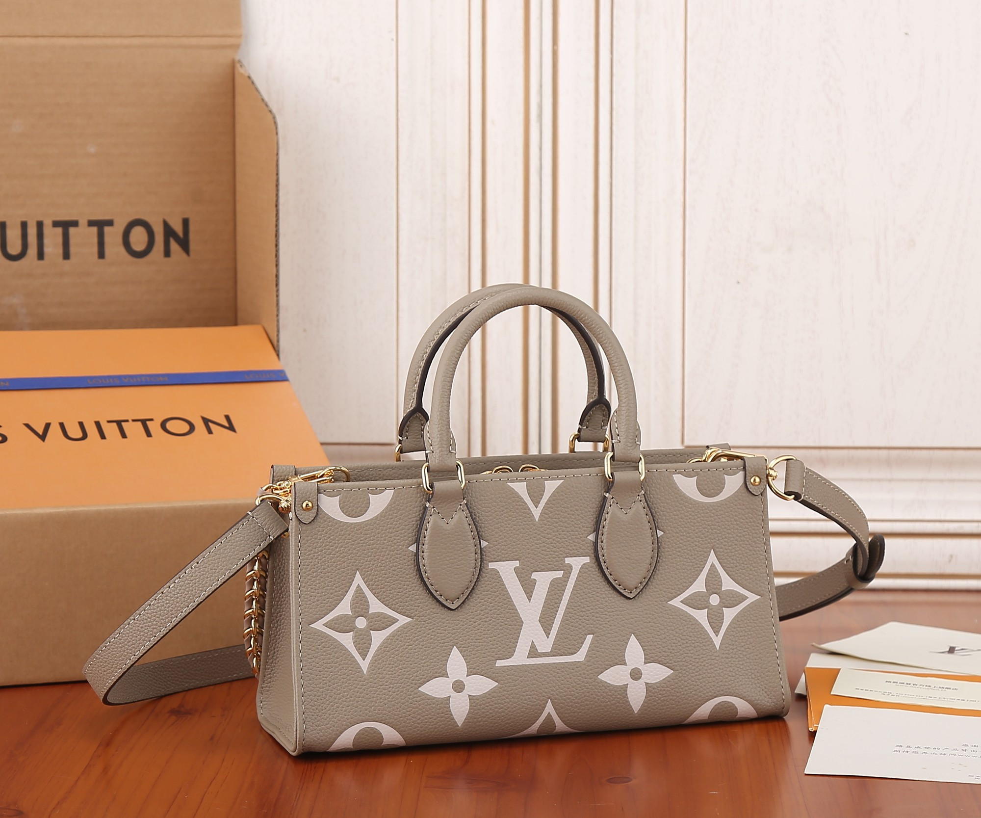 LV OnTheGo East West M23641 9.8 x 5.1 x 3.9 inches