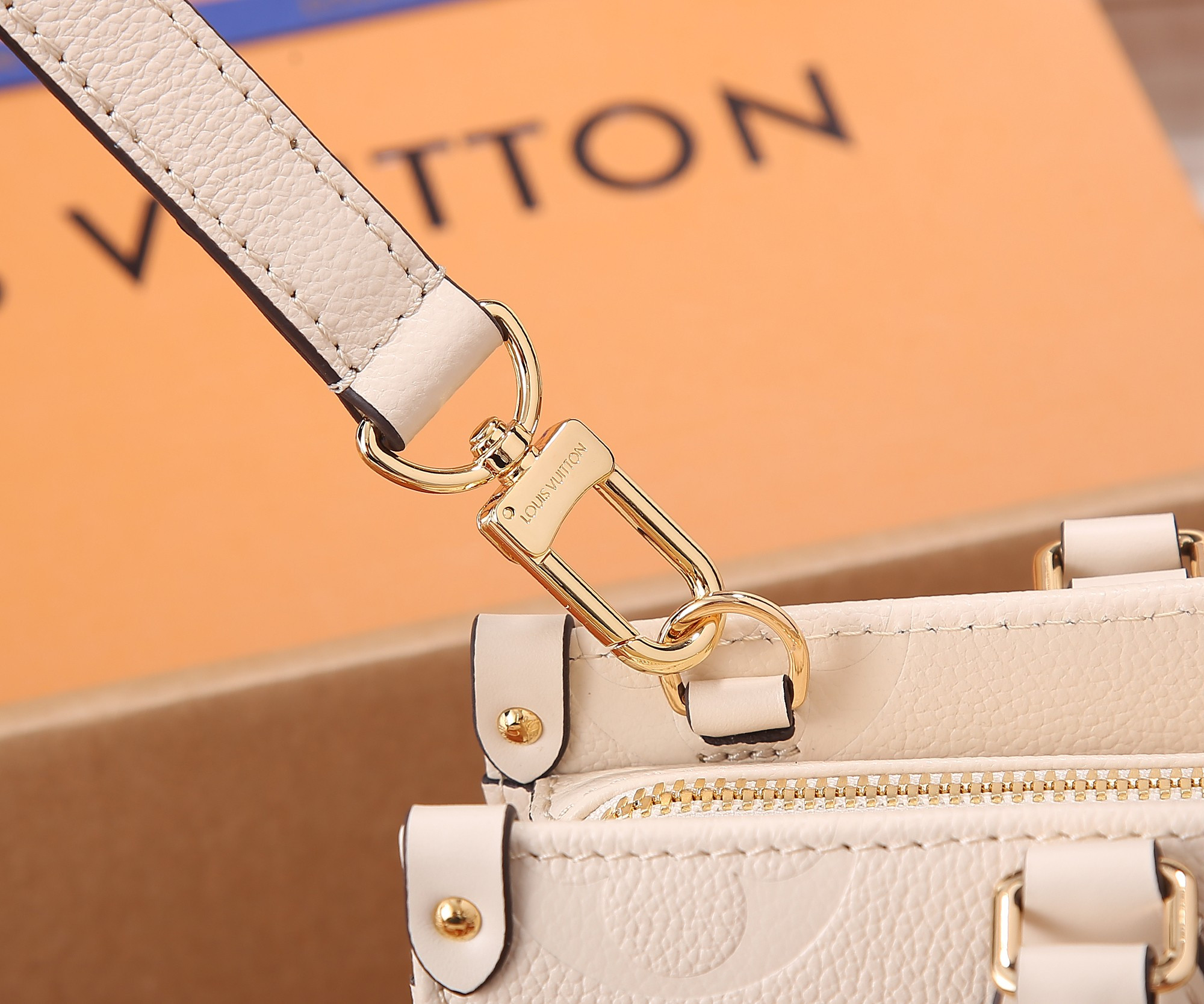 LV OnTheGo East West M23698 9.8 x 5.1 x 3.9 inches