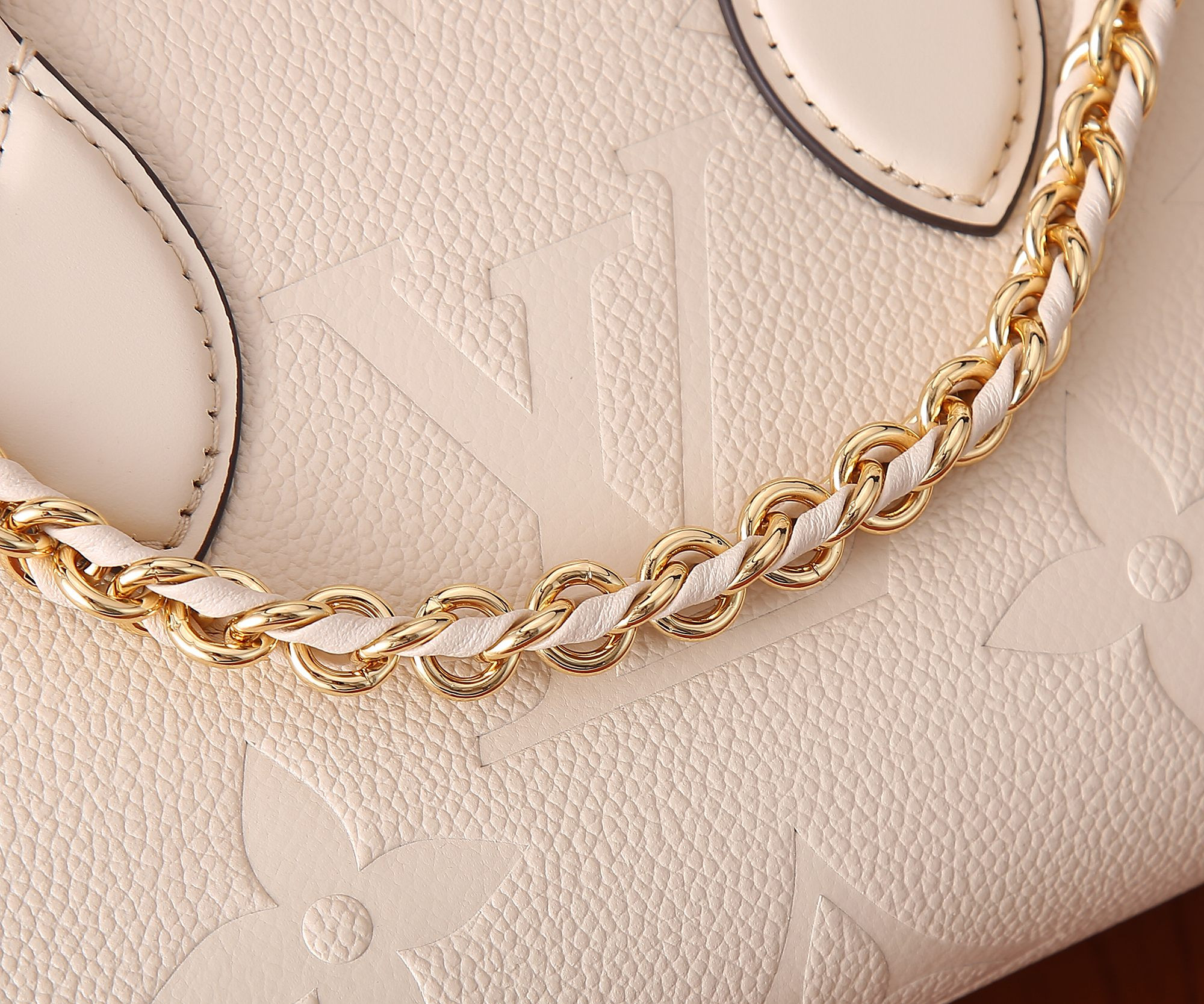LV OnTheGo East West M23698 9.8 x 5.1 x 3.9 inches