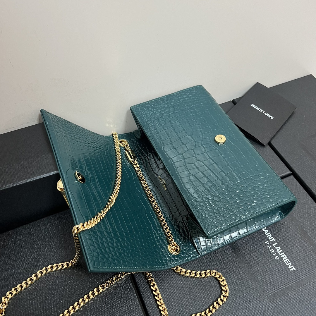 Y*L kate medium tassel in crocodile-embossed leather blue 9.4 x 5.7 x 2.1 inches