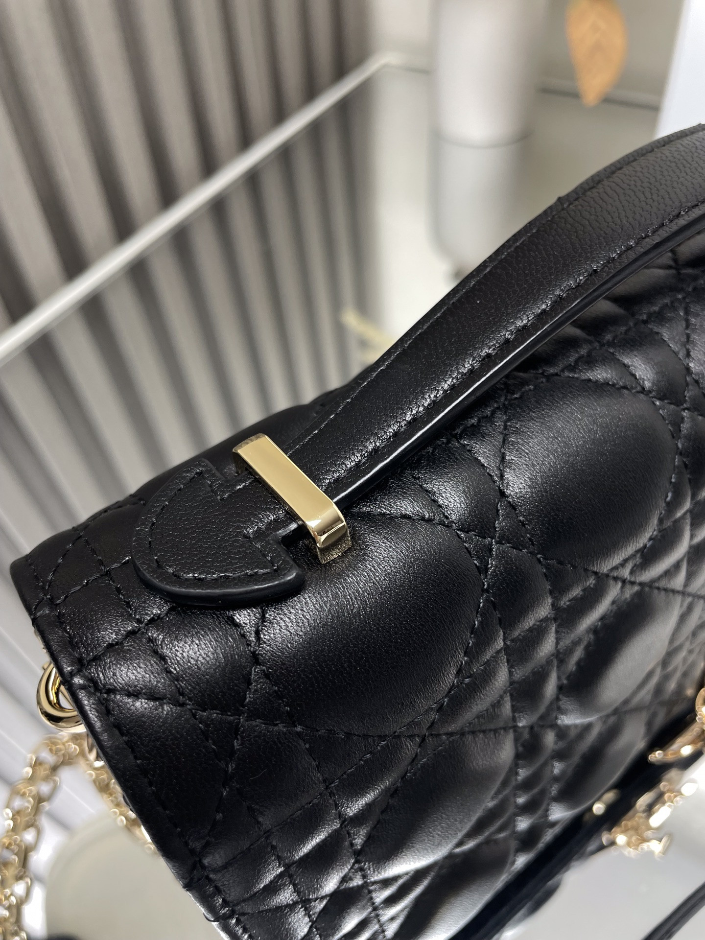 my D*or top handle bag black 9.5 x 5.5 x 3 inches