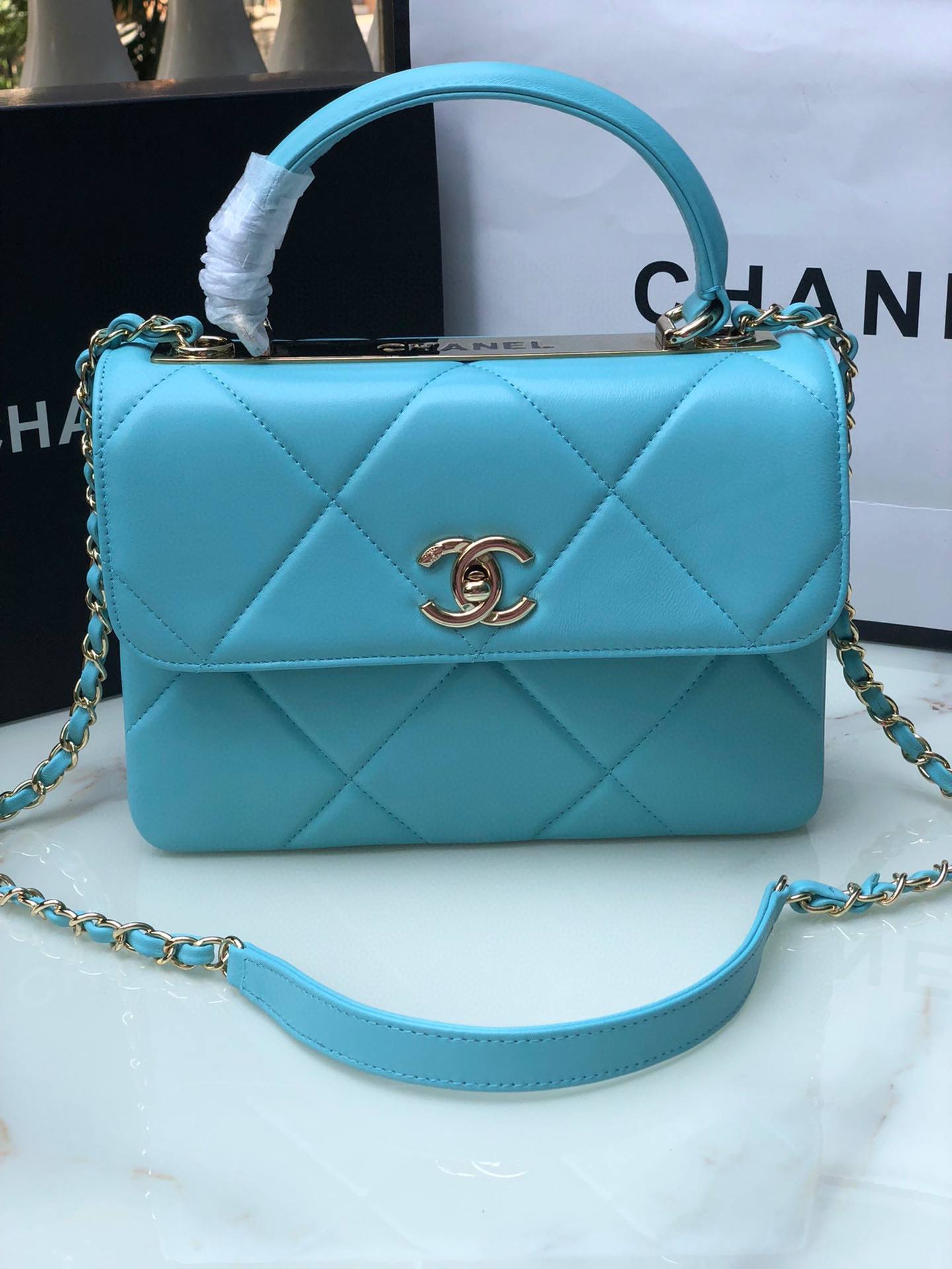 Ch*el flap bag with top handle 6.6 × 9.8 × 4.7 in