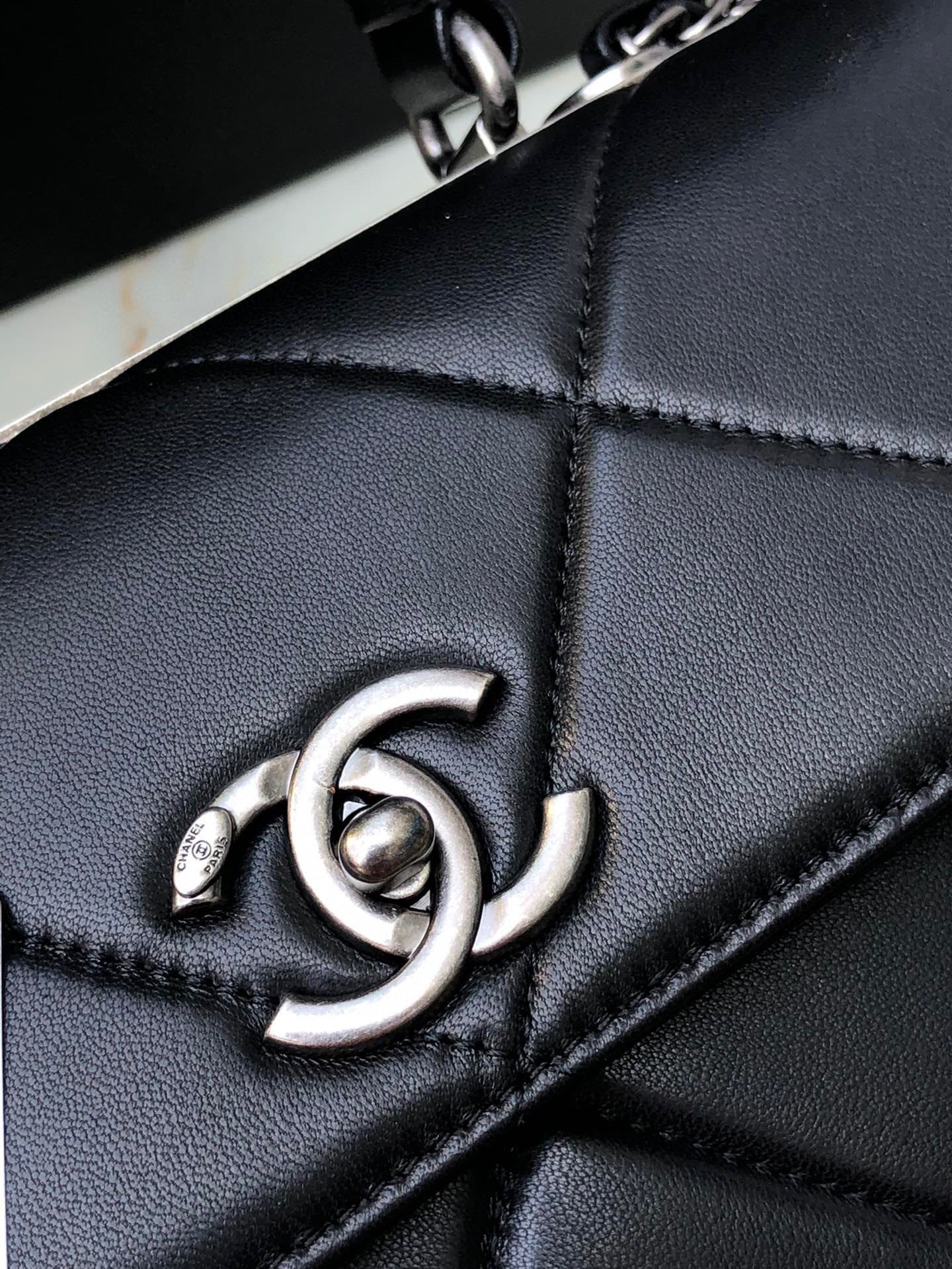 Ch*el flap bag with top handle 6.6 × 9.8 × 4.7 in