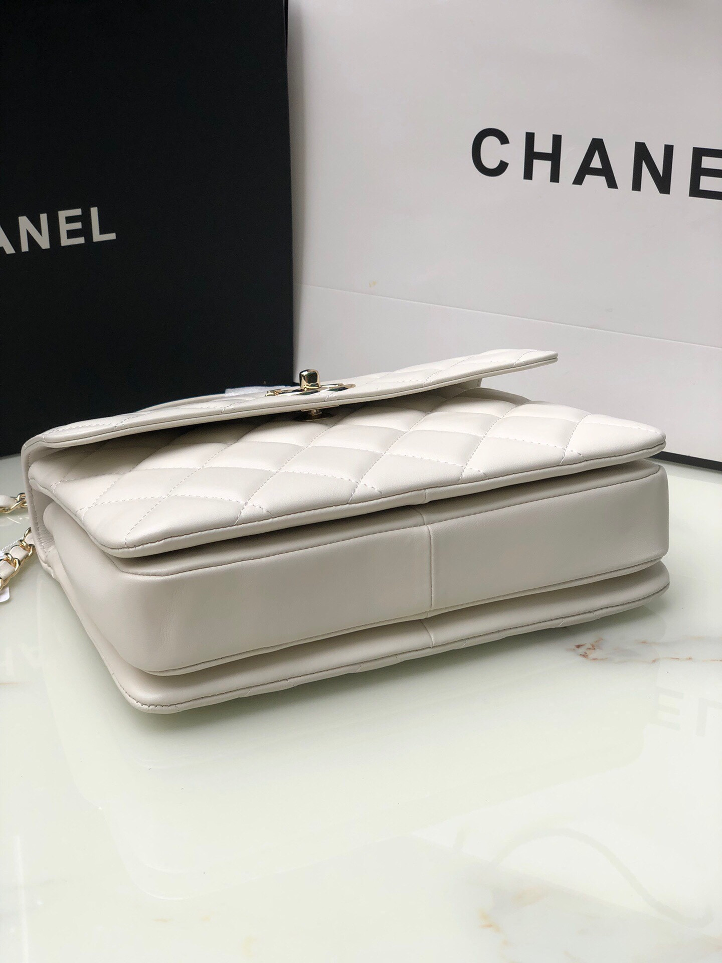 Ch*el flap bag with top handle 6.6 × 9.8 × 4.7 in