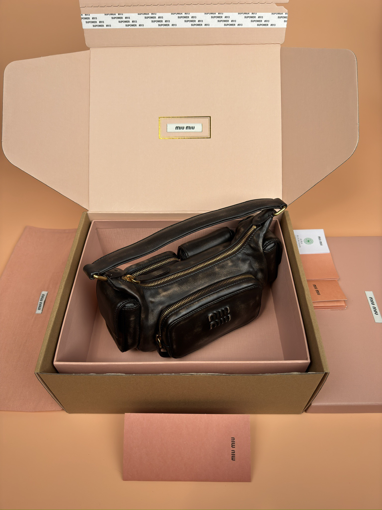 Miu Miu Hobo Nappa leather pocket bag 12x21x6cm