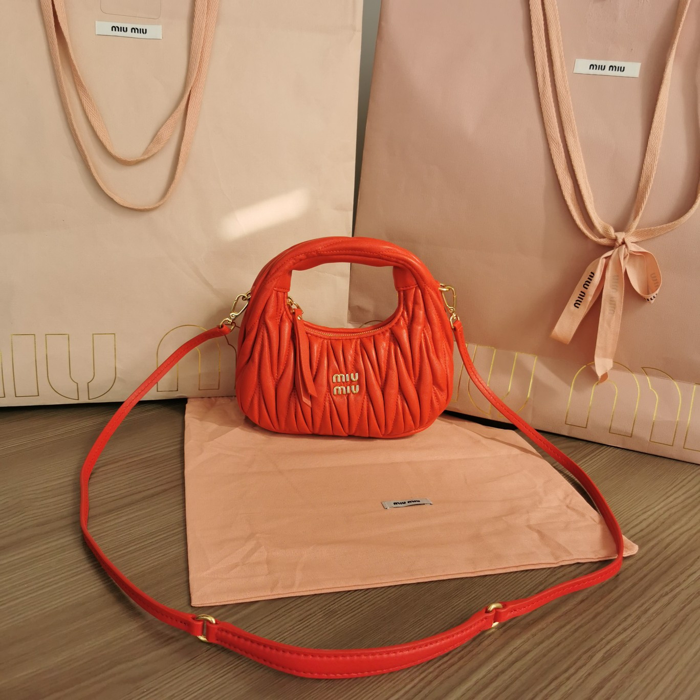 Miu Miu Wander matelassé nappa leather hobo mini-bag 14x17.5x5.5cm